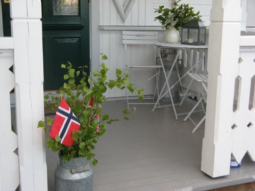 Norwegian Flags on porch